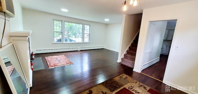 308 Codrington Pl, Bound Brook, NJ 08805 - unfurnished living room with a baseboard heating unit, stairway, wood finished floors, and recessed lighting