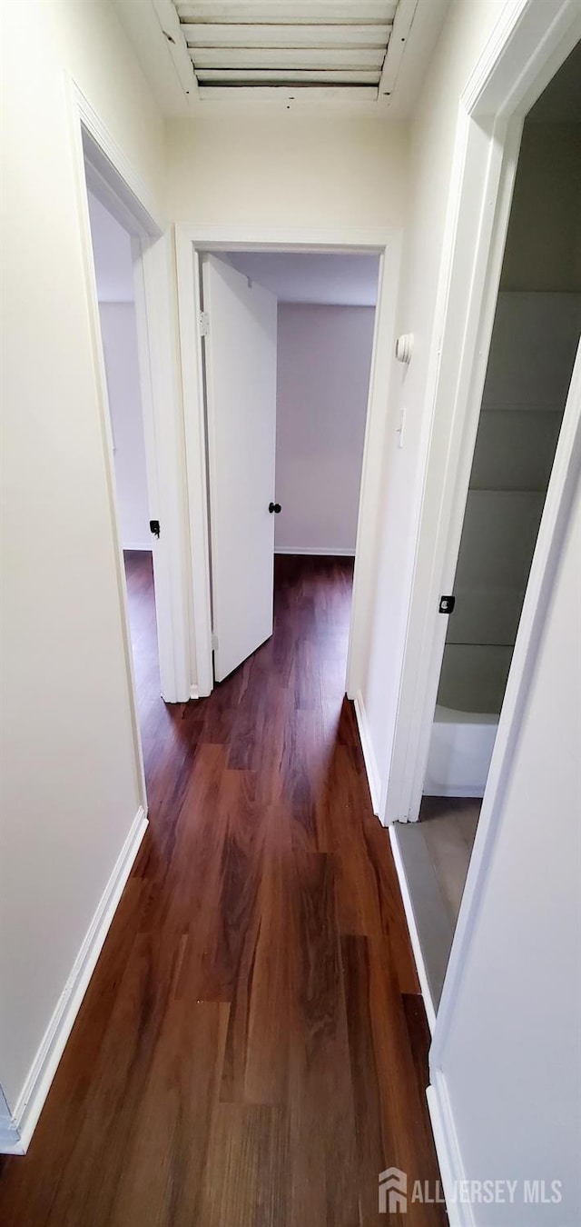 308 Codrington Pl, Bound Brook, NJ 08805 - hallway featuring wood finished floors and baseboards