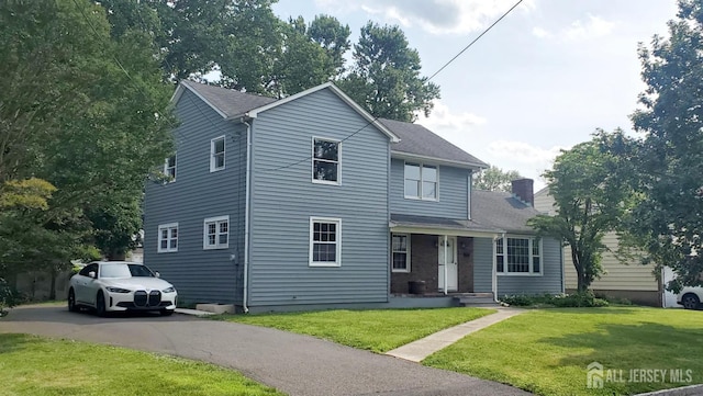 308 Codrington Pl, Bound Brook, NJ 08805 - view of front of house featuring a front yard and driveway