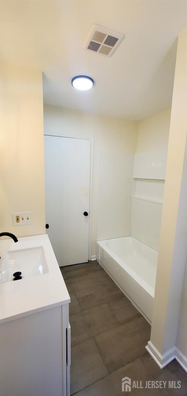 308 Codrington Pl, Bound Brook, NJ 08805 - bathroom with vanity and a tub to relax in