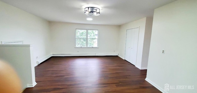 308 Codrington Pl, Bound Brook, NJ 08805 - spare room featuring wood finished floors and a baseboard radiator