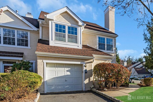 view of property with a garage