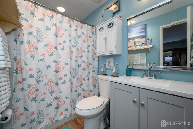 109-B Hemlock Plz, Monroe, NJ 08831 - full bathroom featuring vanity, wood finished floors, and a shower with curtain