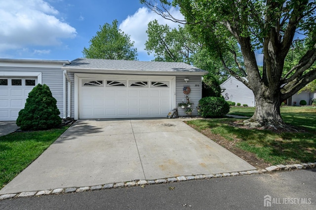 109-B Hemlock Plz, Monroe, NJ 08831 - view of front of home featuring concrete driveway and a garage
