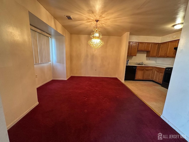 kitchen featuring visible vents, stove, light countertops, black dishwasher, and light carpet