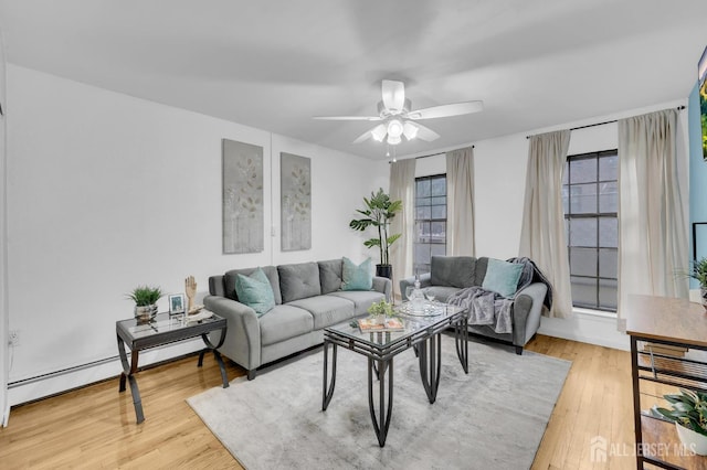 323 Gill Ln Unit 11Q, Iselin, NJ 07067 - living area with wood finished floors and a ceiling fan