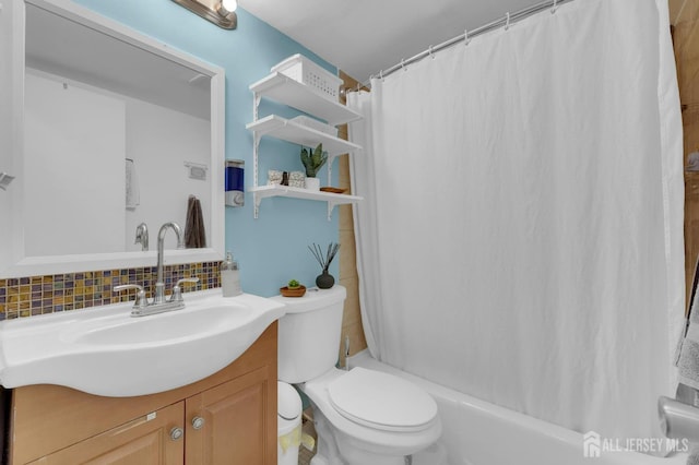 323 Gill Ln Unit 11Q, Iselin, NJ 07067 - full bathroom with vanity, decorative backsplash, toilet, and shower / tub combo