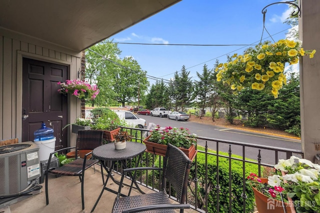 323 Gill Ln Unit 11Q, Iselin, NJ 07067 - covered porch featuring central air condition unit