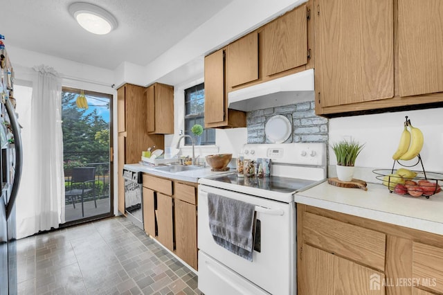 323 Gill Ln Unit 11Q, Iselin, NJ 07067 - kitchen with white electric range, under cabinet range hood, a sink, and light countertops