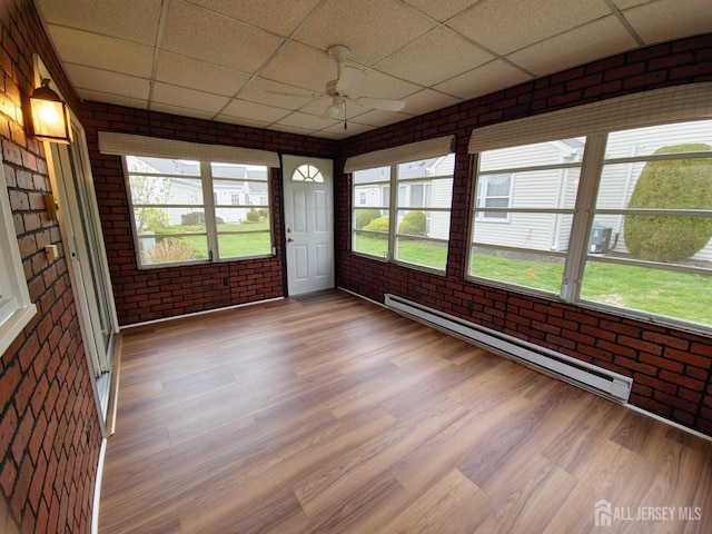 467 New Haven Way Unit A, Monroe, NJ 08831 - unfurnished sunroom with baseboard heating and healthy amount of natural light