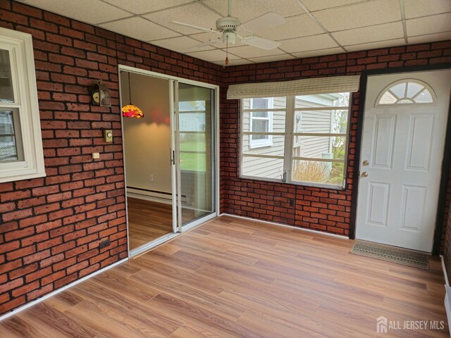 467 New Haven Way Unit A, Monroe, NJ 08831 - unfurnished sunroom with a baseboard heating unit
