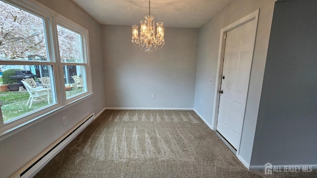 467 New Haven Way Unit A, Monroe, NJ 08831 - carpeted spare room featuring a baseboard radiator, a chandelier, and baseboards