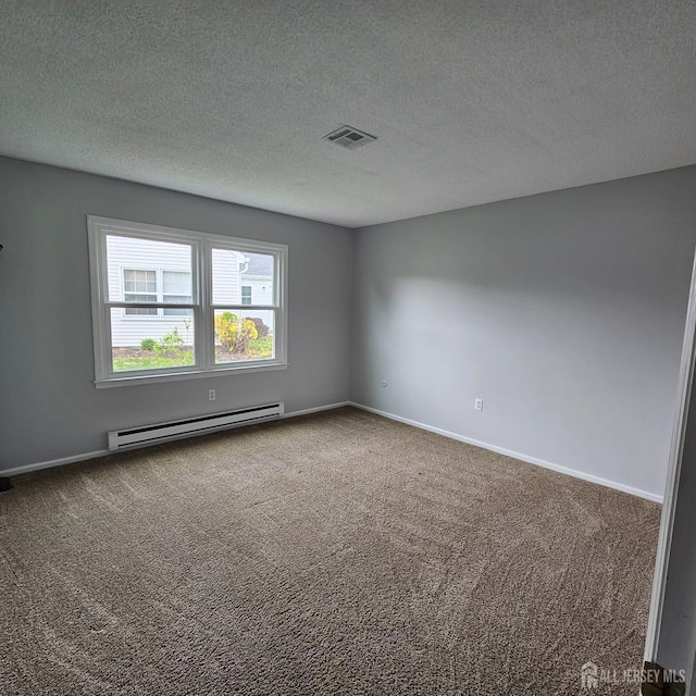 467 New Haven Way Unit A, Monroe, NJ 08831 - empty room with baseboard heating, carpet flooring, a textured ceiling, and baseboards