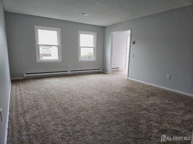 467 New Haven Way Unit A, Monroe, NJ 08831 - carpeted spare room featuring a baseboard radiator and baseboards