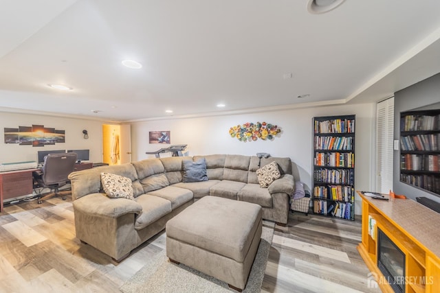 119 Carteret Ave, Carteret, NJ 07008 - living room with a desk, light wood-style flooring, recessed lighting, and crown molding