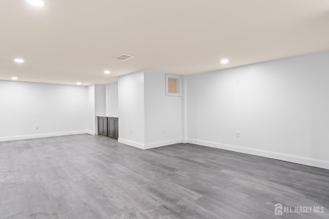 38 Louise Dr, East Brunswick, NJ 08850 - finished basement with recessed lighting and dark wood-style flooring