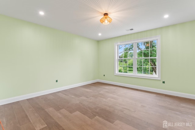 38 Louise Dr, East Brunswick, NJ 08850 - unfurnished room featuring light wood-type flooring and recessed lighting