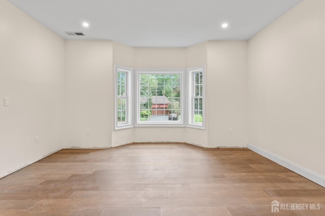 38 Louise Dr, East Brunswick, NJ 08850 - spare room with light wood-type flooring and recessed lighting
