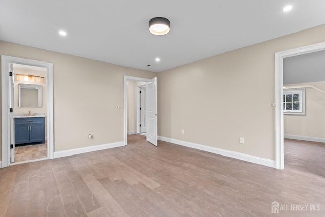 38 Louise Dr, East Brunswick, NJ 08850 - unfurnished bedroom featuring light wood-style floors, recessed lighting, and ensuite bathroom