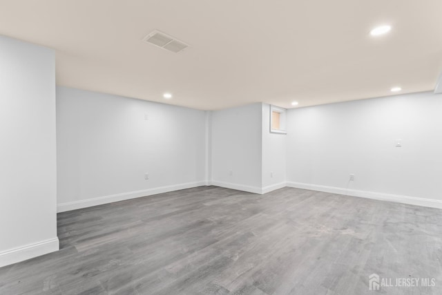 38 Louise Dr, East Brunswick, NJ 08850 - finished basement featuring recessed lighting and wood finished floors