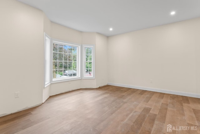 38 Louise Dr, East Brunswick, NJ 08850 - empty room with light wood-style floors and recessed lighting