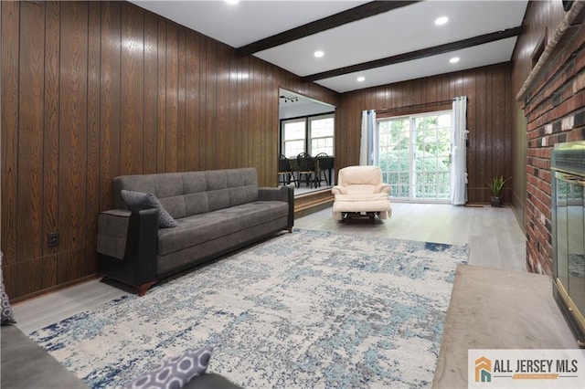 11 Gunpowder Dr, East Brunswick, NJ 08816 - living room featuring beam ceiling, wood walls, wood finished floors, a brick fireplace, and recessed lighting