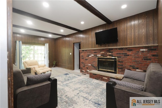 11 Gunpowder Dr, East Brunswick, NJ 08816 - living area with beam ceiling, wood walls, a fireplace, recessed lighting, and light wood-style flooring