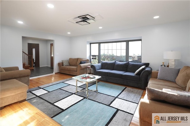 11 Gunpowder Dr, East Brunswick, NJ 08816 - living room with light wood-style floors, stairs, and recessed lighting