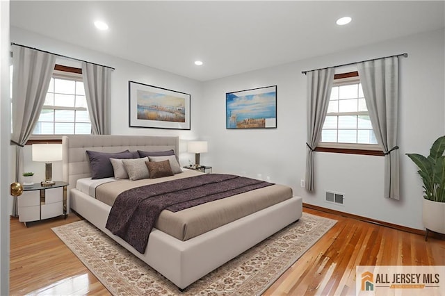 11 Gunpowder Dr, East Brunswick, NJ 08816 - bedroom featuring multiple windows, light wood-type flooring, and recessed lighting