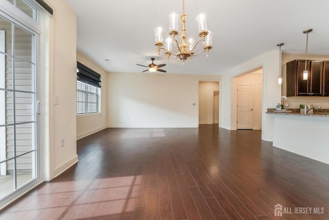 7209 Minuteman Ln, Franklin, NJ 08873 - unfurnished living room featuring dark wood-style floors, a chandelier, ceiling fan, and baseboards
