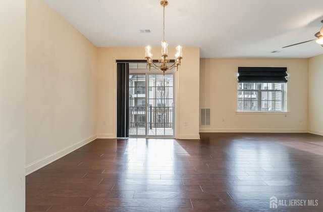 7209 Minuteman Ln, Franklin, NJ 08873 - unfurnished dining area with plenty of natural light, a chandelier, and dark wood-style floors