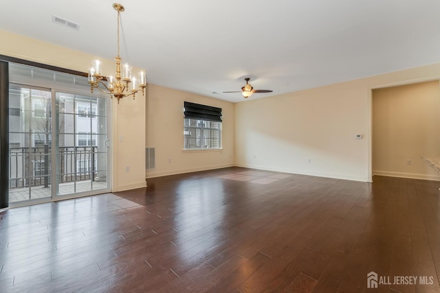 7209 Minuteman Ln, Franklin, NJ 08873 - spare room featuring a chandelier, dark wood-style flooring, baseboards, and a ceiling fan