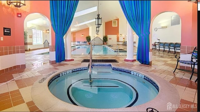 7209 Minuteman Ln, Franklin, NJ 08873 - view of swimming pool with an in-ground hot tub and a patio