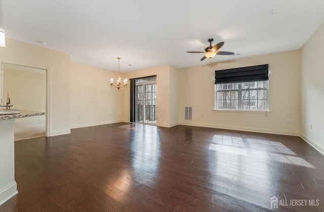 7209 Minuteman Ln, Franklin, NJ 08873 - unfurnished room featuring a chandelier, a ceiling fan, dark wood finished floors, and baseboards