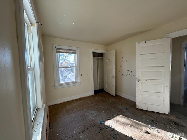 unfurnished bedroom with a closet