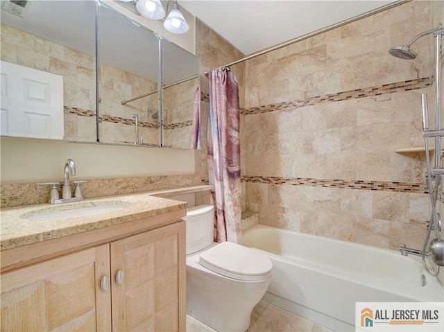 full bathroom featuring vanity, toilet, and shower / bath combo with shower curtain