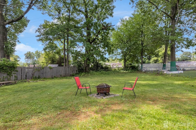 4 Dayton Rd, Edison, NJ 08817 - view of yard featuring an outdoor fire pit
