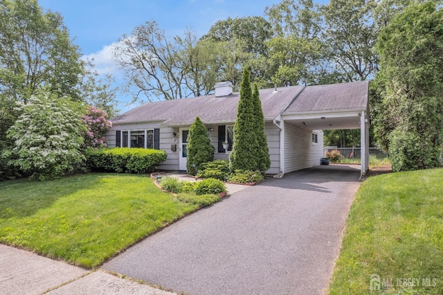 4 Dayton Rd, Edison, NJ 08817 - ranch-style house with a carport, asphalt driveway, a chimney, and roof with shingles
