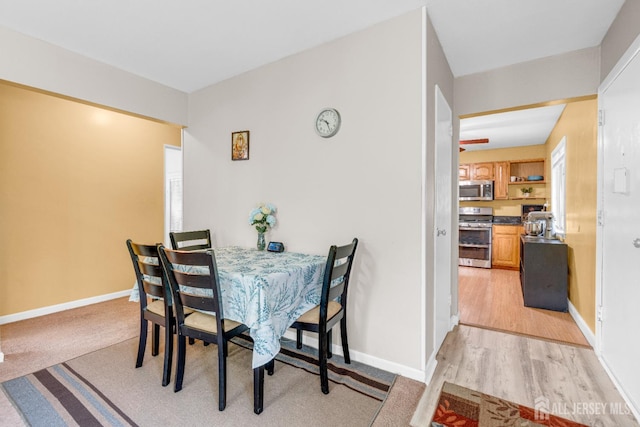 4 Dayton Rd, Edison, NJ 08817 - dining area featuring baseboards and light wood finished floors