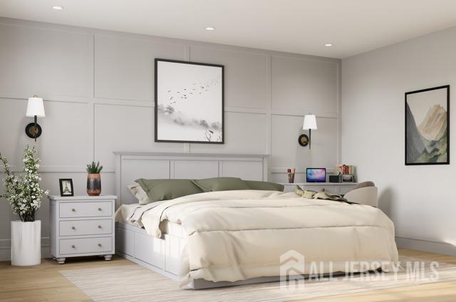 bedroom featuring light hardwood / wood-style flooring