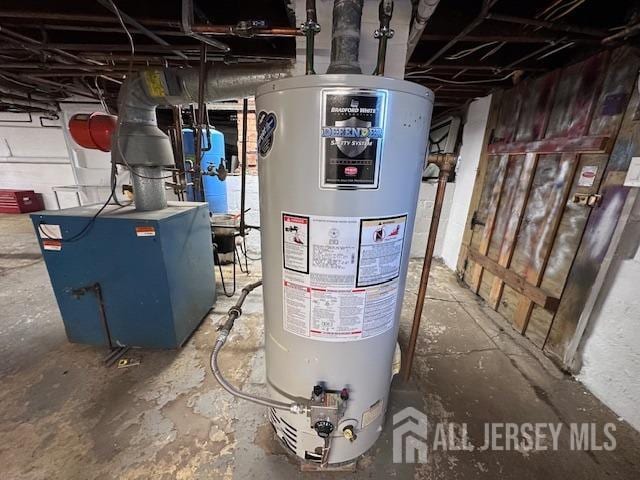 utilities featuring water heater and a heating unit