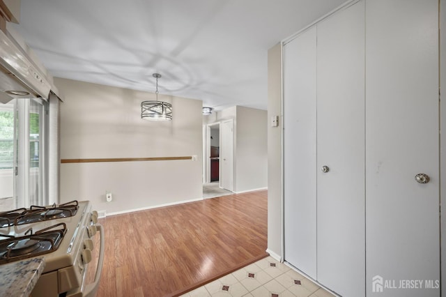 10 Nebraska Dr, Old Bridge, NJ 07747 - dining space with baseboards and light tile patterned floors