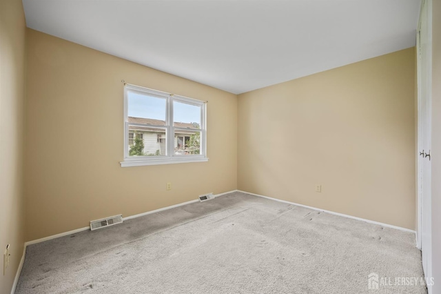 10 Nebraska Dr, Old Bridge, NJ 07747 - empty room with baseboards and carpet flooring