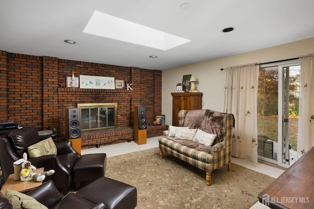 living room with light colored carpet, a skylight, and a brick fireplace