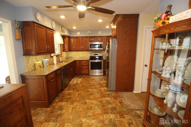 816-C Deal Rd, Monroe, NJ 08831 - kitchen featuring stainless steel appliances, a sink, a ceiling fan, decorative backsplash, and recessed lighting