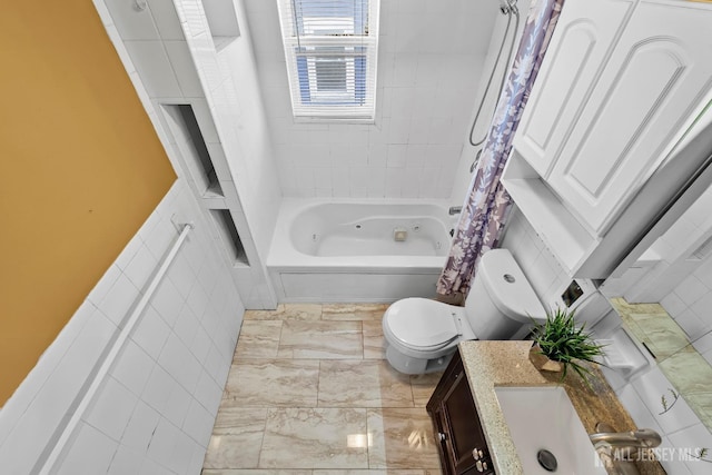 full bath with vanity, tile walls, toilet, and shower / tub combo with curtain