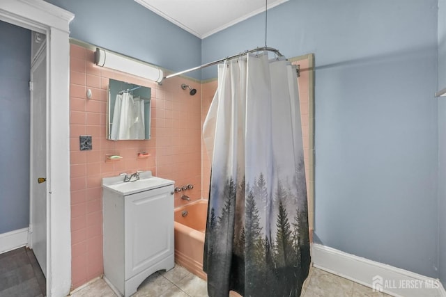 311 Magnolia St, Highland Park, NJ 08904 - full bath with vanity, ornamental molding, tile patterned floors, shower / bath combo with shower curtain, and tile walls
