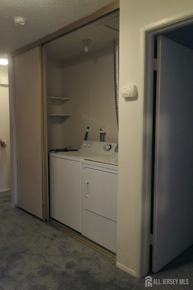 131-C Balsam Plz, Monroe, NJ 08831 - laundry room with separate washer and dryer, carpet flooring, and a textured ceiling