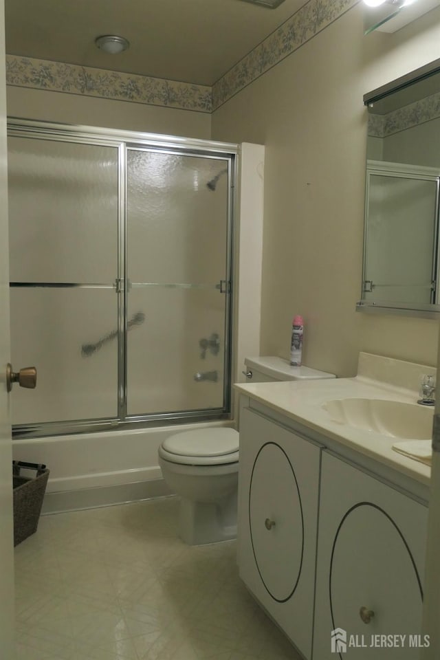 131-C Balsam Plz, Monroe, NJ 08831 - full bathroom with vanity, combined bath / shower with glass door, and tile patterned floors