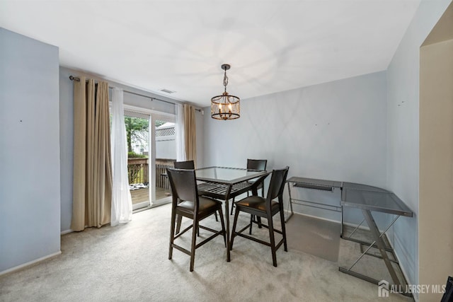 9 Lamberson Ct, Sayreville, NJ 08872 - dining space featuring carpet flooring and a chandelier